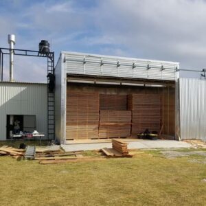 Lumber being dried to remove moisture.